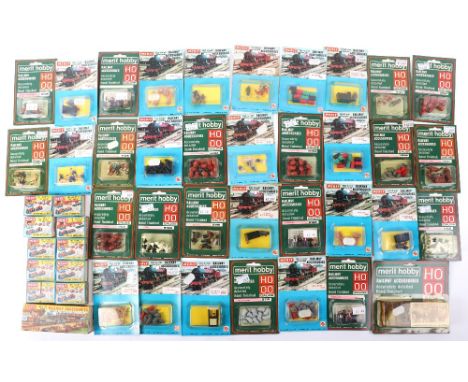 Merit boxed and carded 00/HO gauge station and track side accessories, ten boxed accessories including single arm lamp posts,