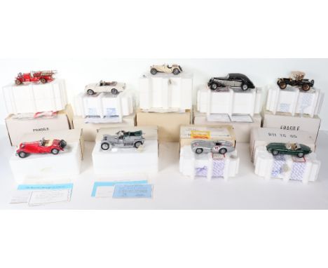 Nine Franklin mint boxed model cars, including, 1922 Ahrens fox, box includes inside polystin, broken wheel and ladders, 1992