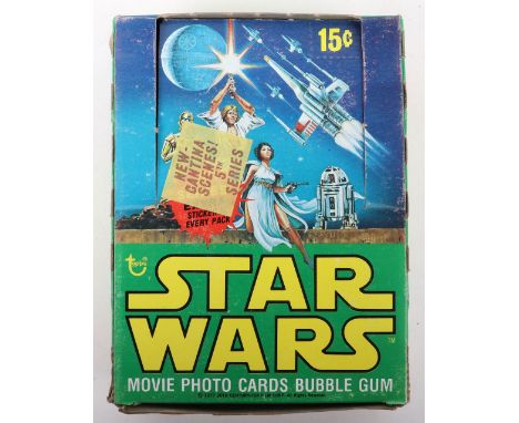 Vintage 1977 Topps Star Wars movie photo cards bubble gum trade box, including 20 packs out of 36, packs look to be sealed bu