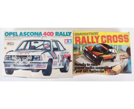 Two Japanese made vintage Remote-controlled cars, including grandstand leisure products, rally cross, box in fair condition r