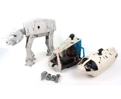 Vintage Star Wars vehicles and playset, including at-at, rebel transporter and darth vader star storyer, all in fair conditio