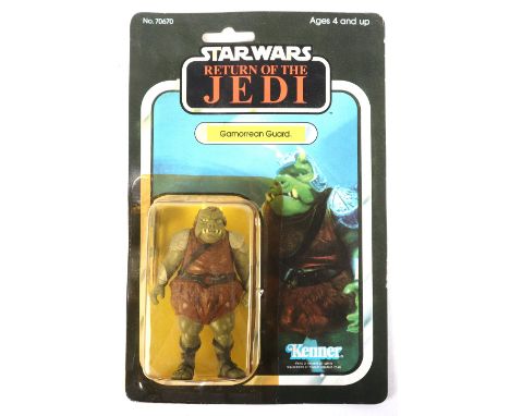Kenner Star Wars Return of The Jedi Gamorrean Guard, Vintage carded figure,3 ¾ inches mint, bubble slight creases but fair(ye