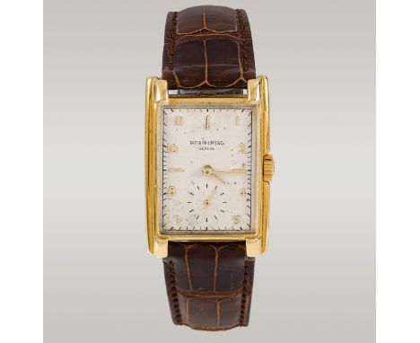 Patek PhilippeHerren-Armbanduhr18kt Gold, Leder; Referenznr. "1570"; Saphirglas, versilbertes Zifferblatt mit kleiner Sekunde