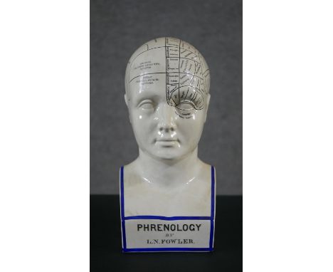A ceramic phrenology head by L.N. Fowler. H.30 W.14 D.10cm 