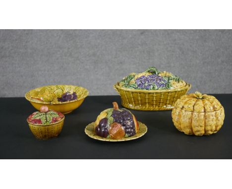 A collection of five early 20th century French Sarreguemines majolica ceramic fruit design jam pots, bowls and butter dish, w