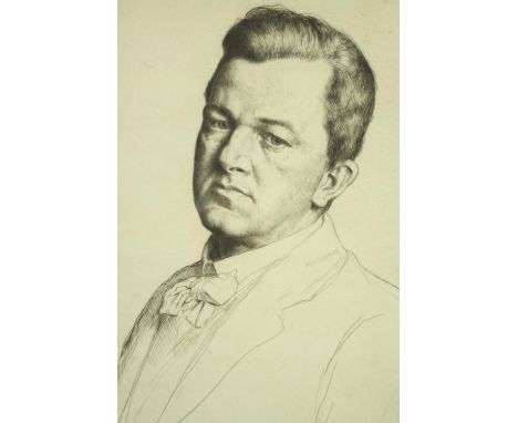 A framed and glazed etching of a portrait of a gentleman in suit and bowtie. Indistinctly signed. H.72 W53cm. 