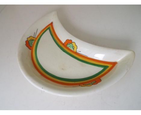 Clarice Cliff - a crescent shaped Honeyglaze dish hand painted in a floral design, 21.5 cm (wide) - Est £25 - £40