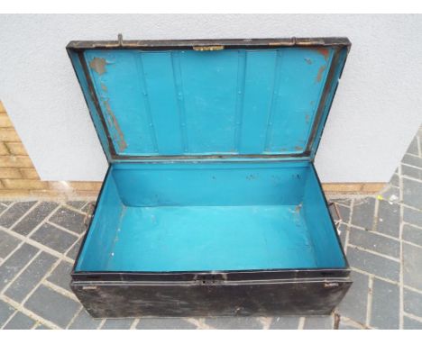 A metal trunk 33 cm (h) x 88.5 cm x 54 cm