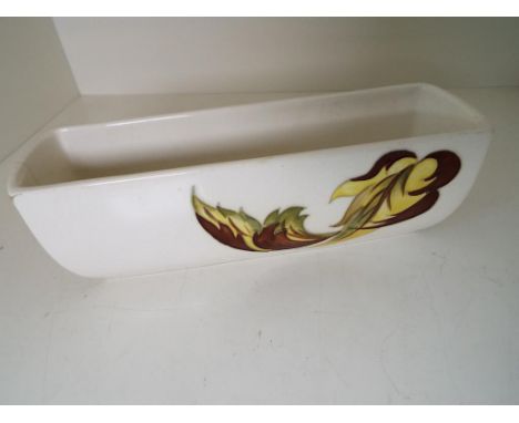 Moorcroft Pottery - a rectangular planter / trough vase decorated in the Autumn Leaves pattern, 6 cm x 20 cm x 6 cm - Est £20