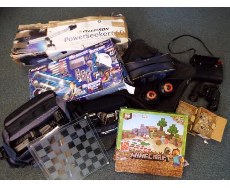 A mixed lot to include a pair of binoculars, a glass chess set, crown green bowls, a selection of vintage camera equipment, a
