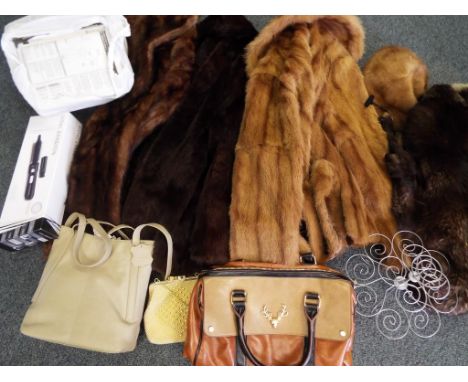 A good lot to include five furs comprising two fur stoles and a fur hat, two fur jackets, one approximately 60 cm in length t