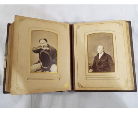 A mid nineteenth century French embossed leather photograph album with gold leaf edged pages (16 cm x 13 cm x 5 cm) containin