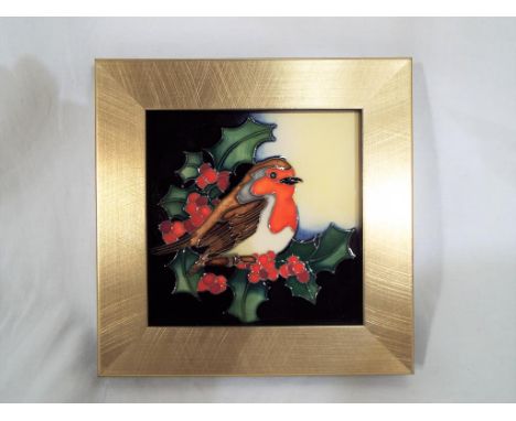 Moorcroft - a good quality Moorcroft framed ceramic tile depicting a robin, marked with Moorcroft stamp and also R.S.P.B. ove