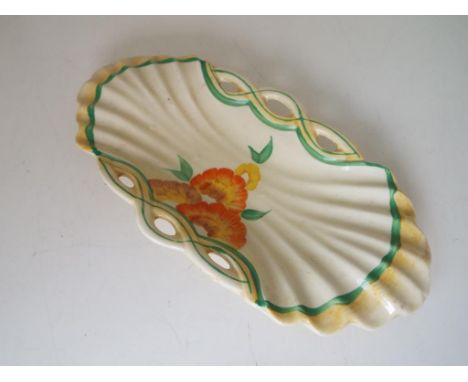 Clarice Cliff - an oval shallow Honeyglaze dish hand painted in a floral design, 23.5 cm x 12 cm - Est £25 - £40