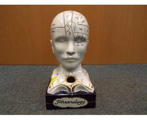 A ceramic phrenology head 35 cm (h) x 18 cm x 20 cm