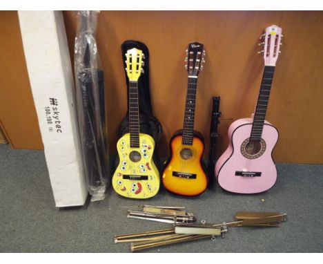 A good mixed lot to include three child's beginner guitars to include a Playon, a Charsley and novelty Nickelodeon Spongebob 