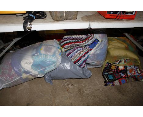 Four bags containing curtains; blankets etc