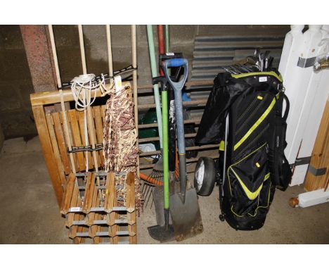 A collection of garden tools to include shovel, spade and rake