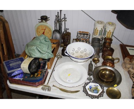 A collection of miscellaneous metal ware to include chrome fireplace companion, brass toasting fork, enamel colander, various