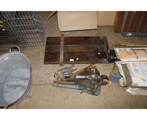 A trouser press and a collection of hand tools