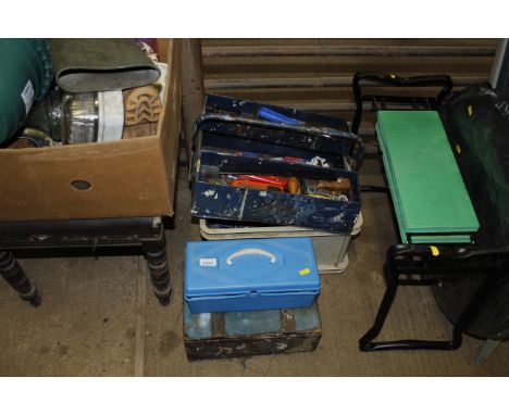 A collection of tool boxes and contents of tools