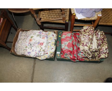 A collection of various curtains, mostly floral pattern