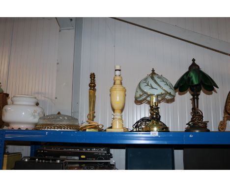 Four various table lamps; a ceiling light and a glass lamp shade