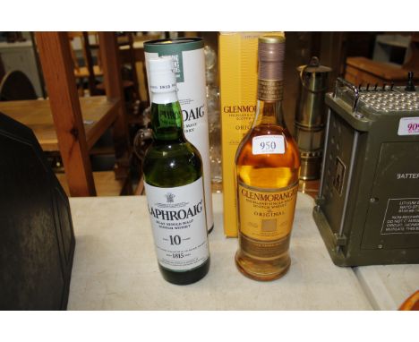 A bottle of Laphroaig 10 year old single malt Scotch whisky and a bottle of Glenmorangie Highland single malt whisky with box