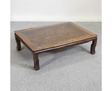 A low Chinese style hardwood coffee table, 100 x 71cm, together with an ebonised side table (2)