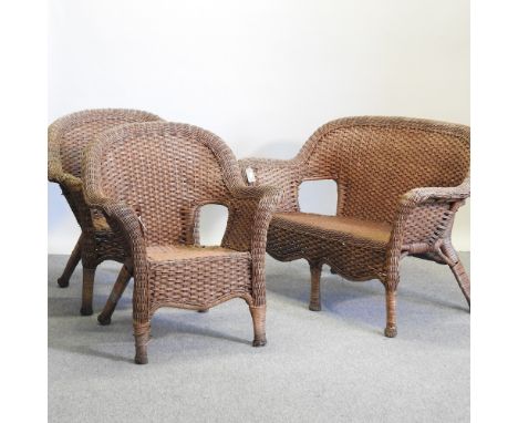 A wicker three piece suite, comprising a sofa, 125cm, and two chairs