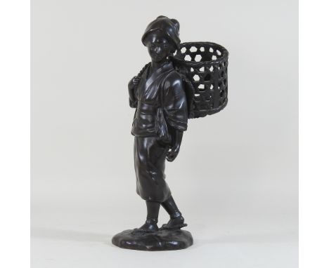 An early 20th century Japanese bronze figure of a lady, shown standing, holding a basket over her shoulder, signed to base, 3