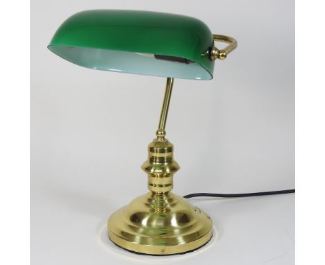 A 1920's style brass desk lamp, with a green glass shade, 28cm high