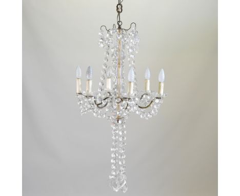 A French gilt metal and glass six branch chandelier, suspended with facet cut drops, 80cm high overall