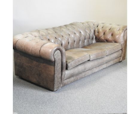 A green leather upholstered button back chesterfield sofa, 205cm