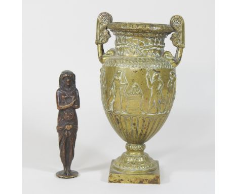 A 19th century Grecian bronze gilt vase, of urn shape, relief decorated with figures, 21cm high, together with an Egyptian br