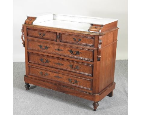 A 19th century French walnut marble top commode, on turned feet, 107cm