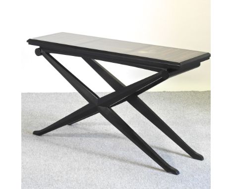 A contemporary hardwood console table, on an x-frame base, 140cm