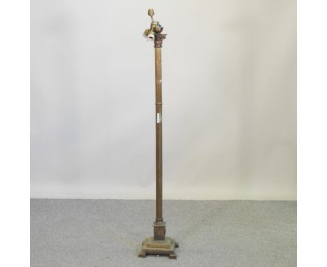 A brass standard lamp, in the form of a Corinthian column, 154cm high