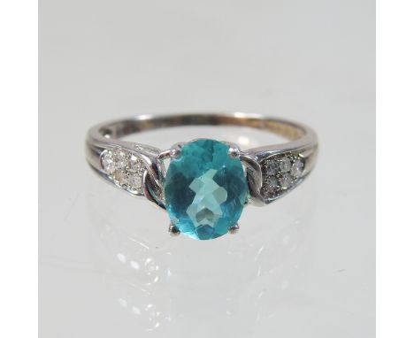 A 9 carat gold green tourmaline and diamond ring, size Q/R, 2.5g gross, cased