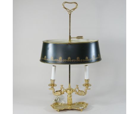 A brass and tole style table lamp and green shade, 65cm high