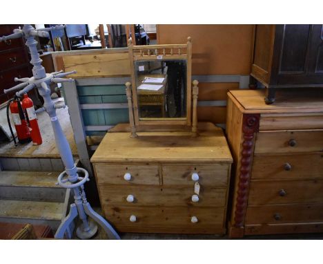 A Victorian pine mirrored back dressing chest of two short over two long drawers, with ceramic knobs, width 102cm, depth 50cm