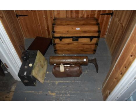 A metal bound pine dome top travelling trunk, record players, a Gladstone bag and a boot stretcher with turned wooden mount (