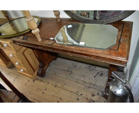 A 19th century inlaid oak rise-and-fall writing table, length 122cm, depth 54cm, height 81cm (in need of restoration).