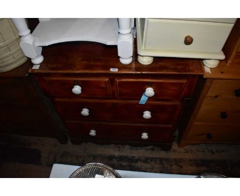 A 19th century stained pine chest of two short over two long drawers, on bracket feet, with ceramic handles, width 90cm, dept
