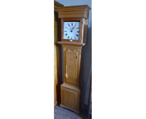 A 19th century pine cased longcase clock, the painted dial set with Roman numerals, the pine case with shaped rectangular doo