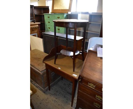 An Edwardian mahogany writing table with raised back and leatherette material, to spade feet, width 74cm, together with an Ed