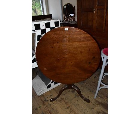 A Georgian mahogany tilt-top tripod table.