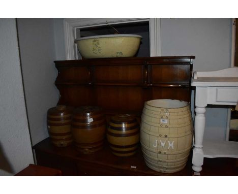 Three stoneware whisky/water dispensers in the form of barrels, height 38cm, a further ceramic example with initials JWM and 