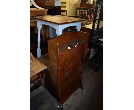 An early 20th century oak student's bureau, together with a modern pub table (2).