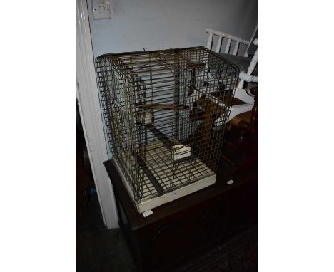 A vintage birdcage, height 66cm.
